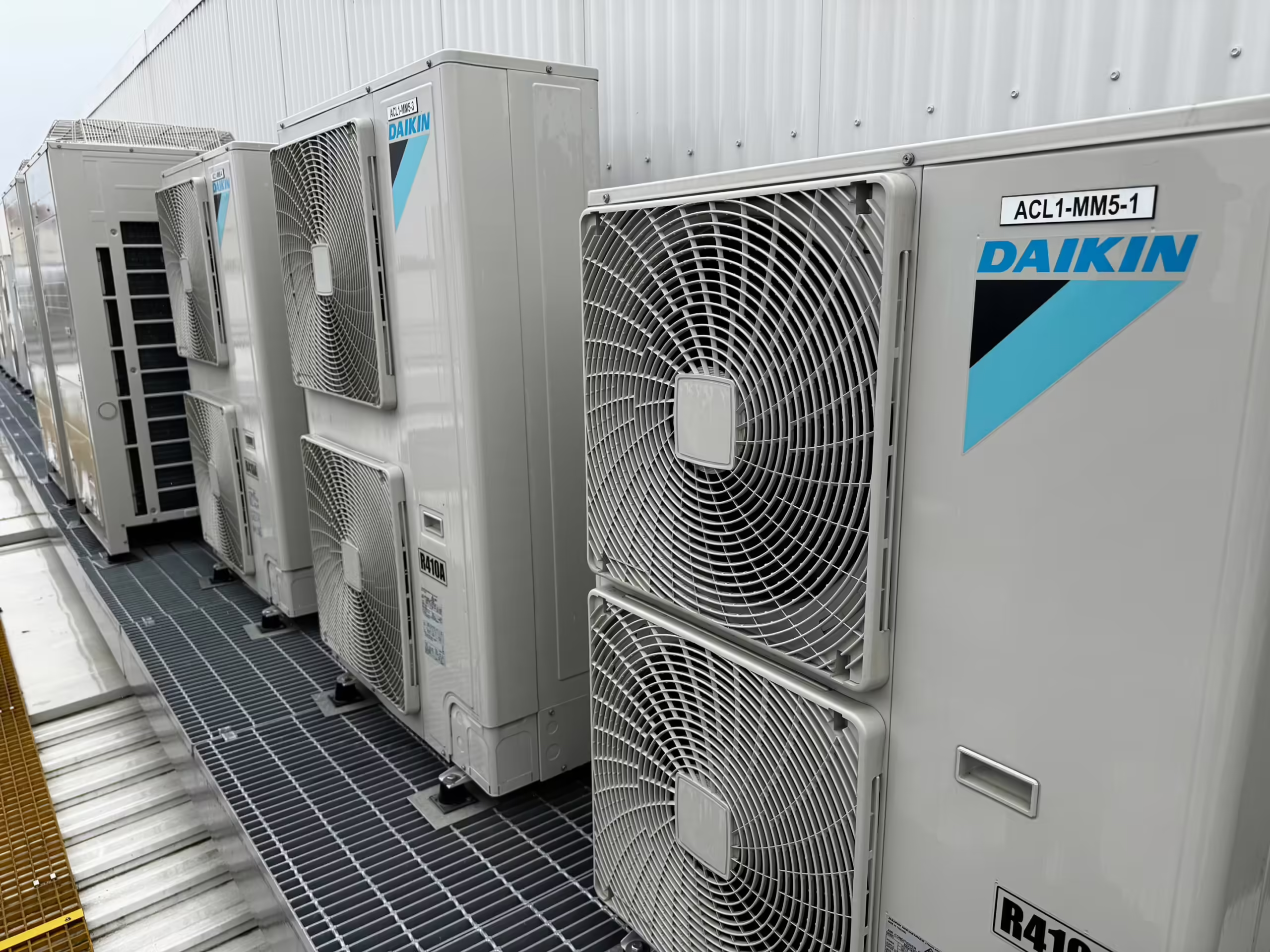 commercial air conditioning units on the roof of a commercial building